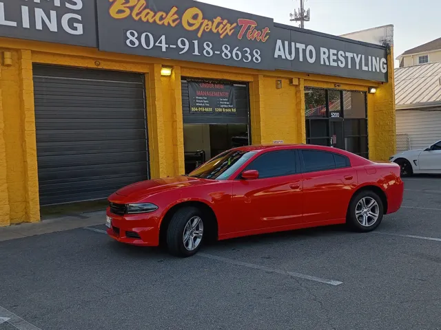 Red Dodge Charger tinted at Black Optix Tint North Richmond